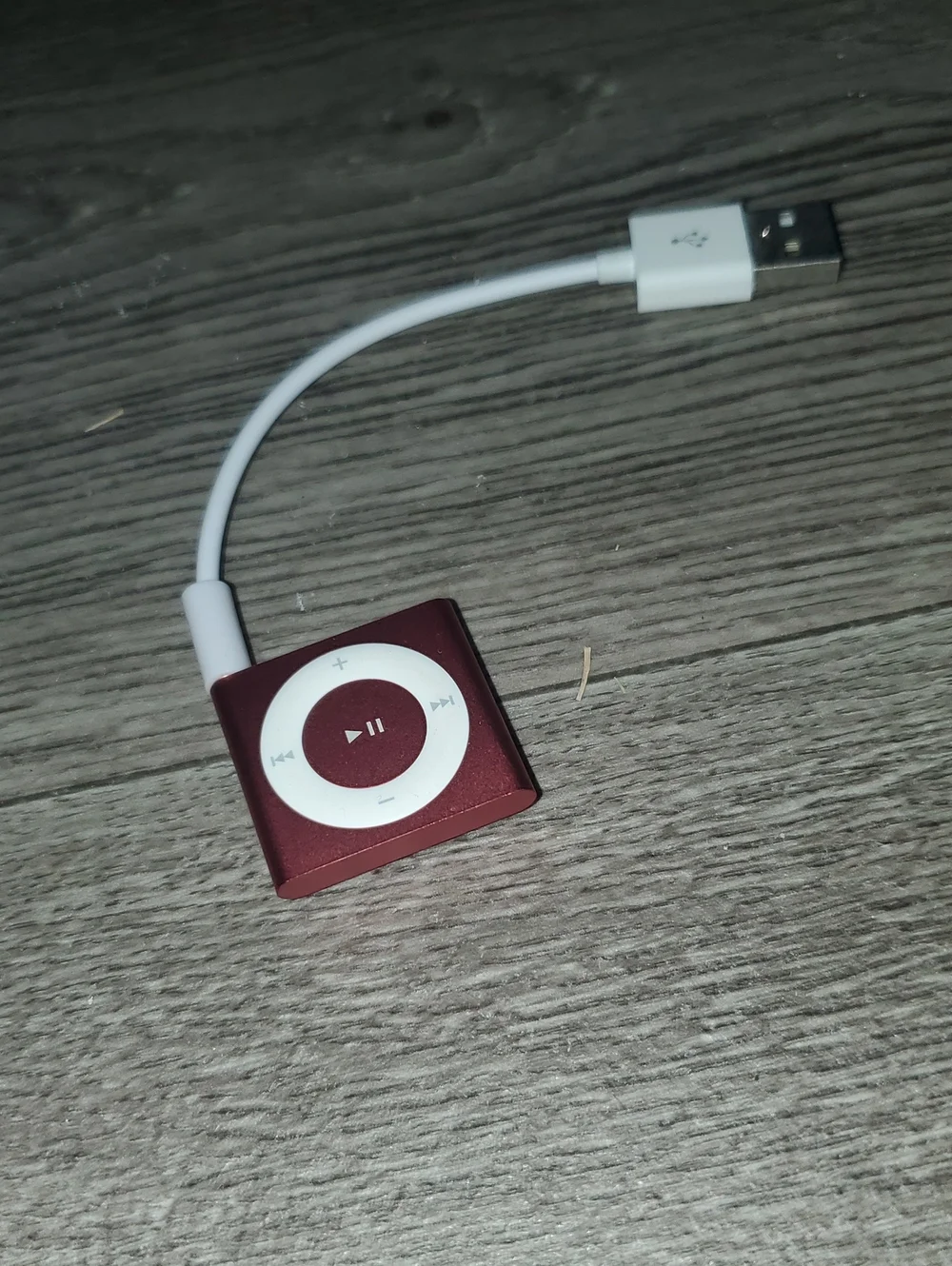 Vintage pink Apple iPod Shuffle (4th Generation, 2GB storage, Model A1373).